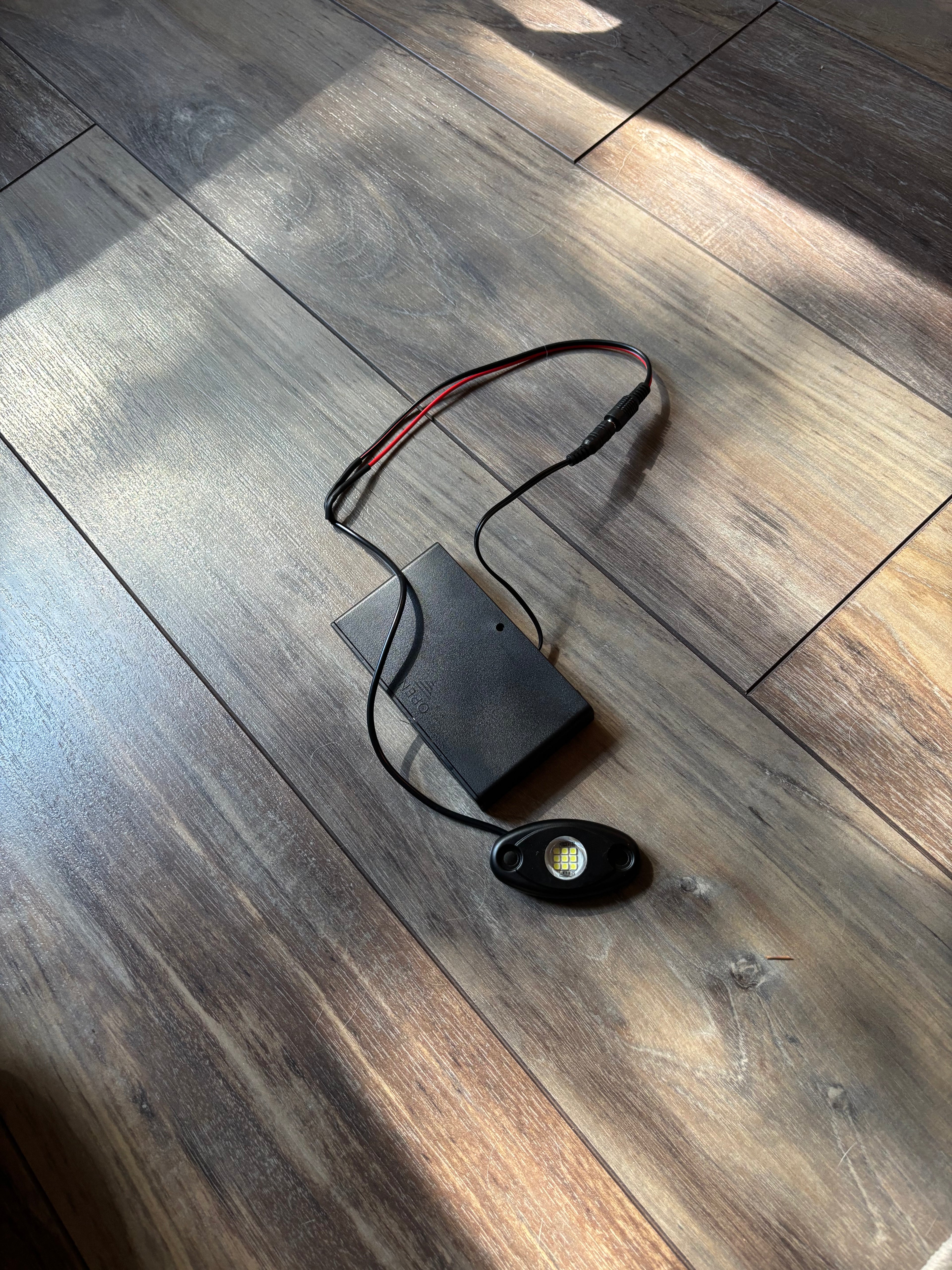 Battery powered rock light universal